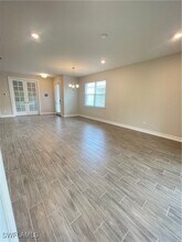1011 Enbrook Lp in Naples, FL - Building Photo - Building Photo