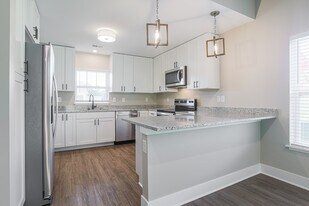 The Flats of Acme Village in Williamsburg, MI - Building Photo