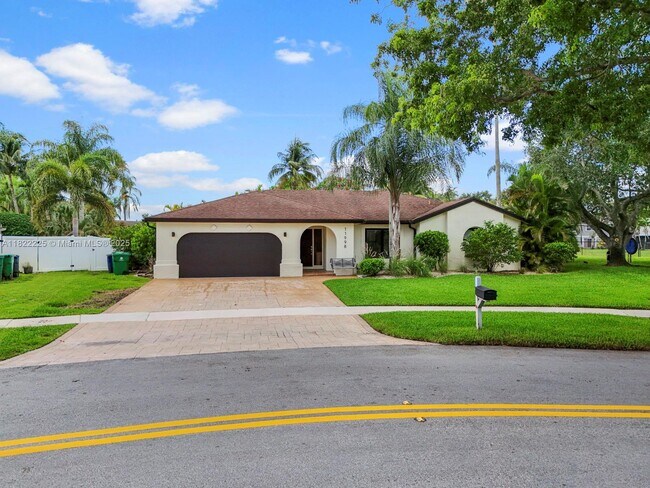 11998 SW 51st Ct in Cooper City, FL - Building Photo - Building Photo