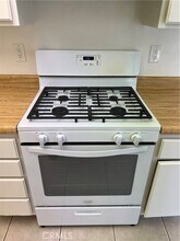 2340 Benidorm Cir-Unit -104 in Corona, CA - Foto de edificio - Building Photo