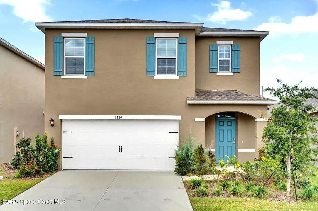 1444 Berry Ln in Davenport, FL - Building Photo