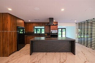 3711 Battersea Rd in Miami, FL - Building Photo