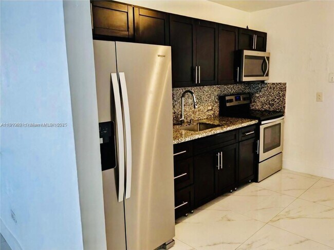 property at 1220 E 10th Ave