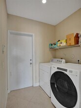 5977 NW 73rd Ct in Parkland, FL - Building Photo - Building Photo