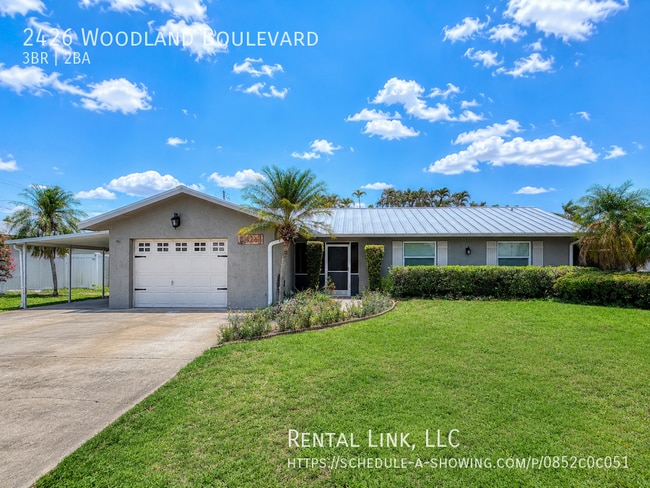 property at 2426 Woodland Blvd