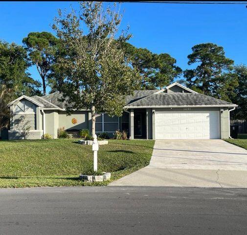 1697 SW Clover St in Port St. Lucie, FL - Building Photo - Building Photo