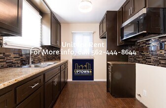 2115-2117 W 103rd Pl in Los Angeles, CA - Building Photo - Building Photo