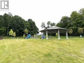 54 Bearberry Rd in Springwater, ON - Building Photo