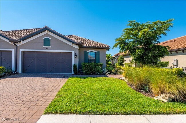 15191 Tolmino St in Naples, FL - Building Photo - Building Photo