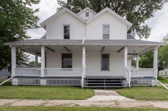 property at 213 E 3rd St