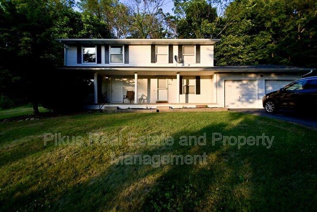 property at 13634 Mogadore Ave NW