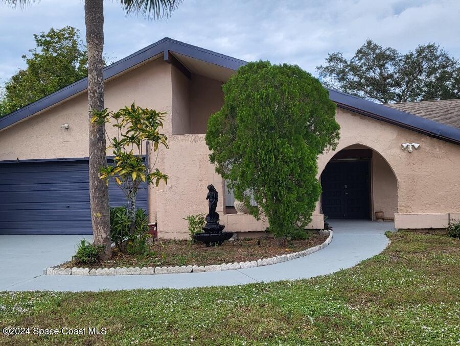 1347 Cherry Hills Rd NE in Palm Bay, FL - Building Photo