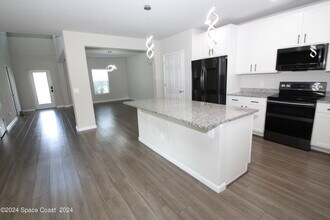 695 Boughton Way in West Melbourne, FL - Building Photo - Building Photo