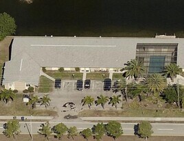 Community Pool / All Tiled Unit with a screened in lanai / Water Included & 1 mnth FREE, Unit 913 Gleason Pkwy #2 in Cape Coral, FL - Building Photo