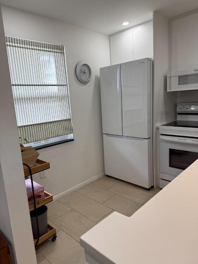 9360 Lime Bay Blvd, Unit 314 in Tamarac, FL - Foto de edificio - Building Photo