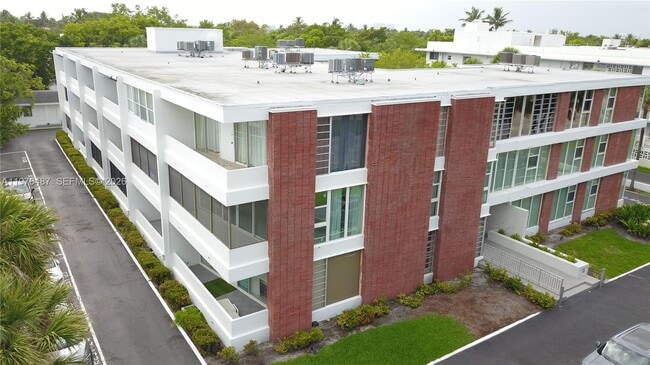 property at 10210 Collins Ave