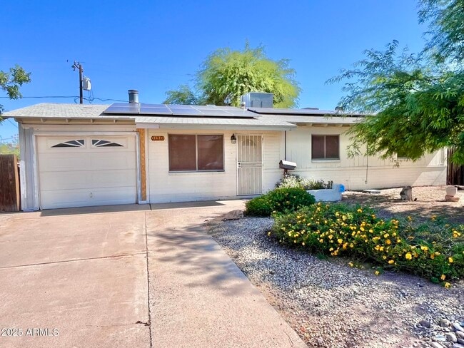 property at 1130 W 10th St