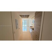 1300 Brickell Bay Dr in Miami, FL - Building Photo