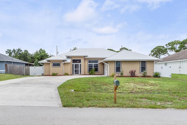 1280 SW Kalevala Dr in Port St. Lucie, FL - Building Photo - Building Photo