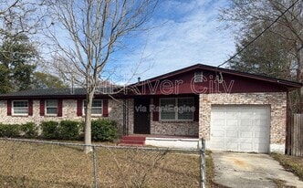 7471 John F Kennedy Dr W in Jacksonville, FL - Building Photo