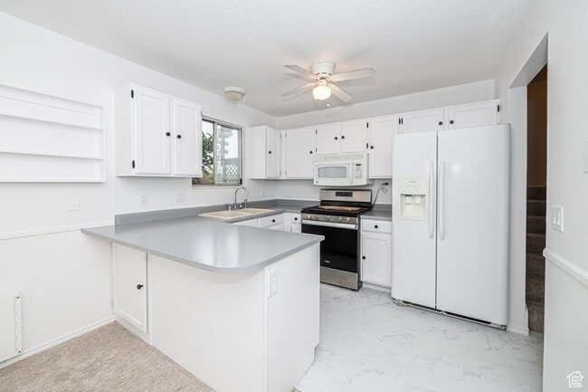 6329 S Fairwind Dr in Taylorsville, UT - Foto de edificio - Building Photo
