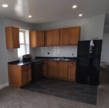 7061 Elmhurst St, Unit FL 2 in Detroit, MI - Foto de edificio - Building Photo