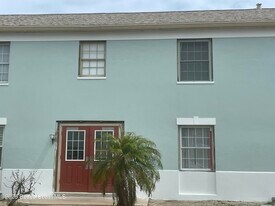 115 E Colonial Ct in Indian Harbour Beach, FL - Building Photo