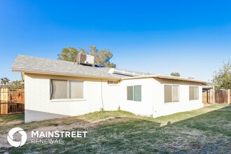 7719 W Clayton Dr in Phoenix, AZ - Building Photo - Building Photo