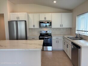 724 Hatton Ln SE in Palm Bay, FL - Building Photo - Building Photo