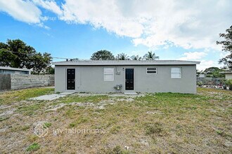 415 Cheyenne Dr in Atlantis, FL - Building Photo - Building Photo