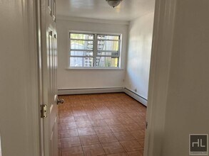 49 AVENUE, Unit 1 in Queens, NY - Building Photo - Building Photo