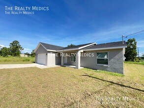 297 Malauka Run in Ocklawaha, FL - Building Photo - Building Photo