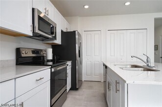 14267 Oviedo Pl in Tice, FL - Building Photo - Building Photo