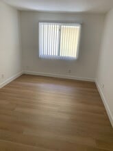 7045 Woodley Ave, Unit 209 in Van Nuys, CA - Building Photo - Building Photo