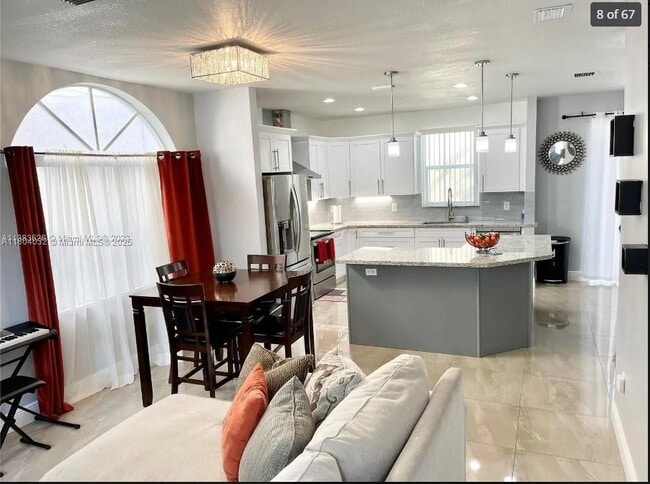 409 NW 87th Ln in Coral Springs, FL - Building Photo - Building Photo