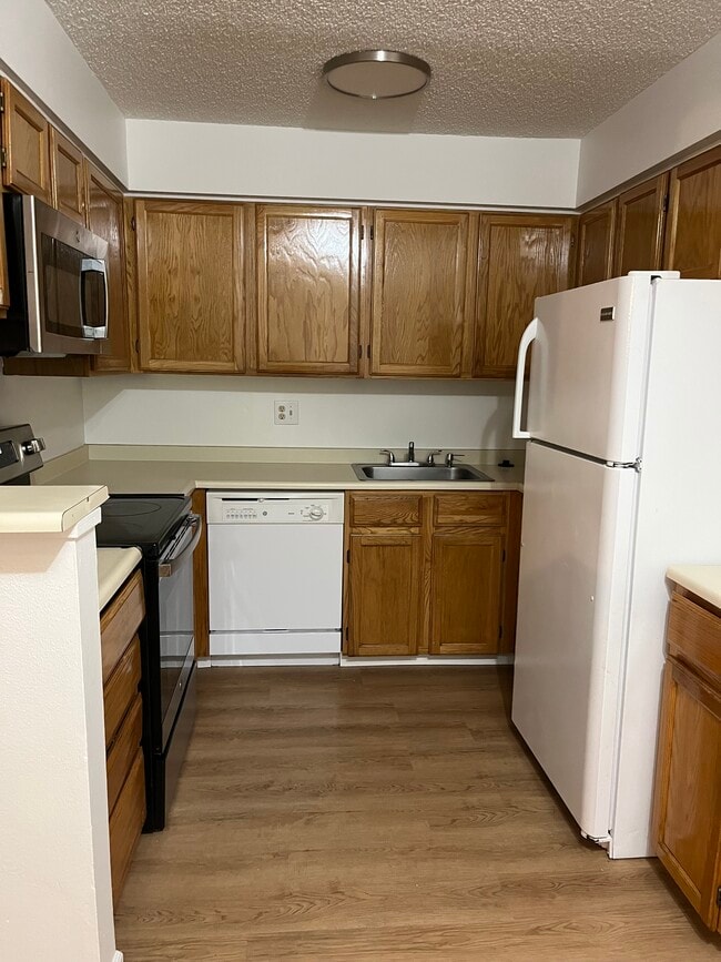 12001 E Harvard Ave, Unit 13-104 in Aurora, CO - Building Photo - Building Photo
