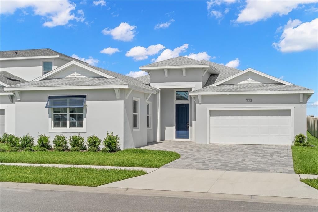 8834 Drummer Plank Dr in Wesley Chapel, FL - Building Photo