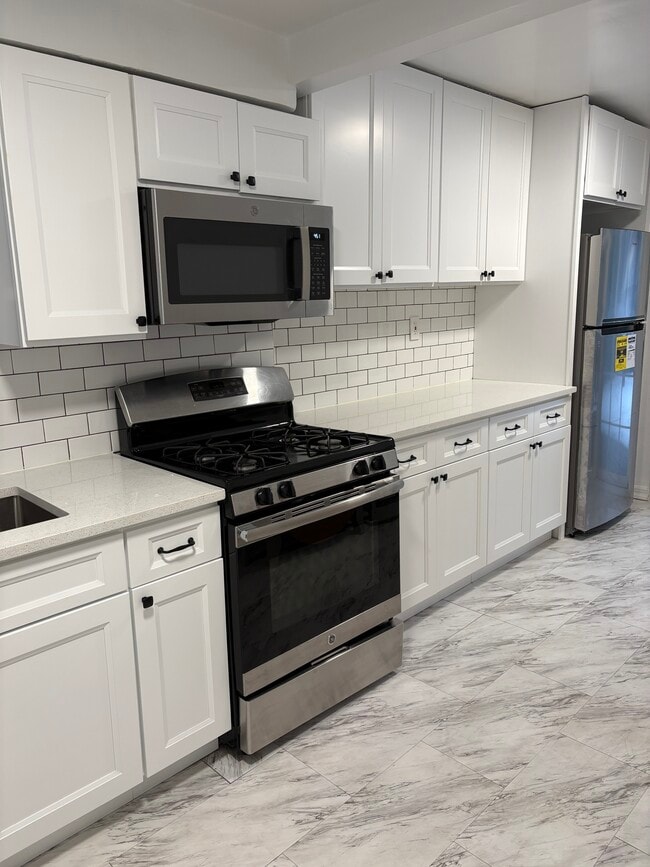 property at 64-15-115 108th St