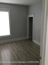 1037 E Oakland Ave-Unit -Duplicate of 1 in Lansing, MI - Building Photo - Building Photo