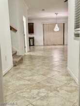 20590 W Golden Elm Dr in Estero, FL - Building Photo - Building Photo