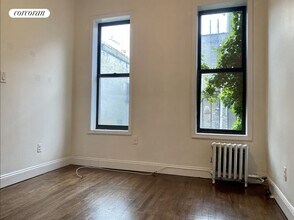 215 E 4th St in New York, NY - Building Photo - Building Photo