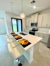 14043 SW Thorens Dr in Port St. Lucie, FL - Building Photo - Building Photo