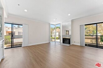 8558 Chalmers Dr in Los Angeles, CA - Building Photo - Building Photo