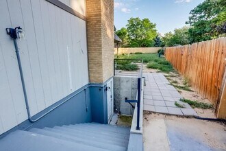 15054 E Dartmouth Ave in Aurora, CO - Building Photo - Building Photo