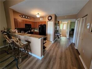 20301 Estero Gardens Cir-Unit -201 in Estero, FL - Building Photo - Building Photo