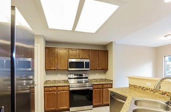 12802 E Wyoming Cir in Aurora, CO - Building Photo - Building Photo