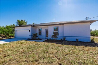 13089 Xavier Ave in Port Charlotte, FL - Building Photo - Building Photo