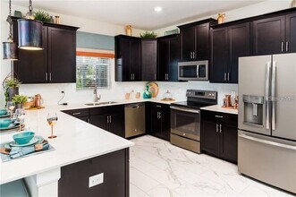1673 Moon Valley Dr in Davenport, FL - Foto de edificio - Building Photo