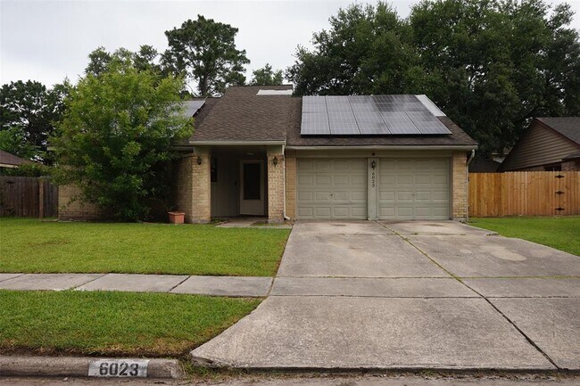 property at 6023 Woodmancote Dr