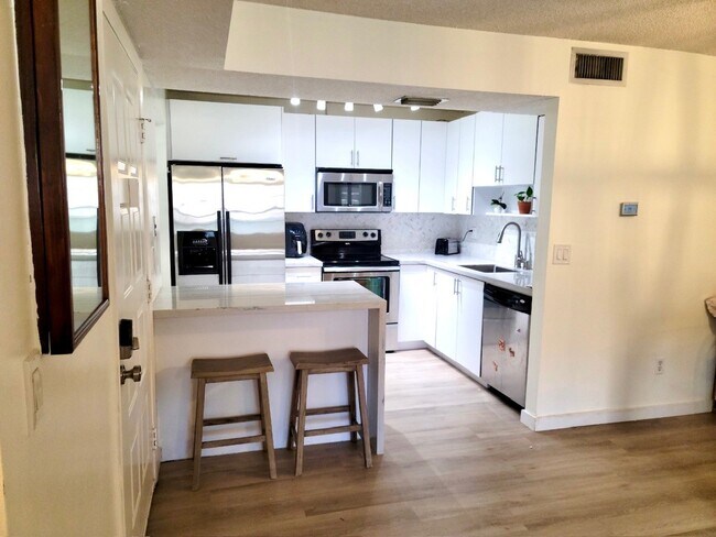 property at 11905 NW 11th St